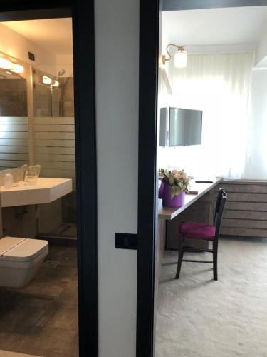 Koupelna v ubytování Hotel Corsa