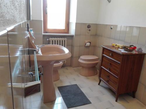 a bathroom with a sink and a toilet at Podere San Ferdinando in Arcidosso