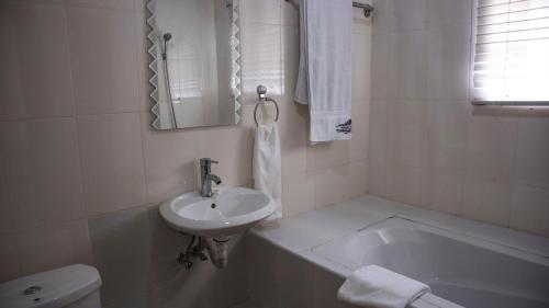 Ένα μπάνιο στο Villa Angelia Hotel