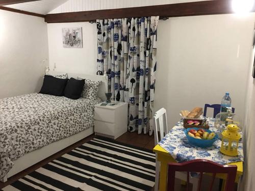 Postel nebo postele na pokoji v ubytování Adega guest house