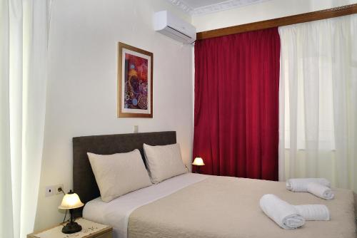 Llit o llits en una habitació de Aristea's Apartment