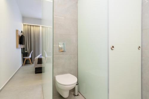 Koupelna v ubytování Renieris Hotel