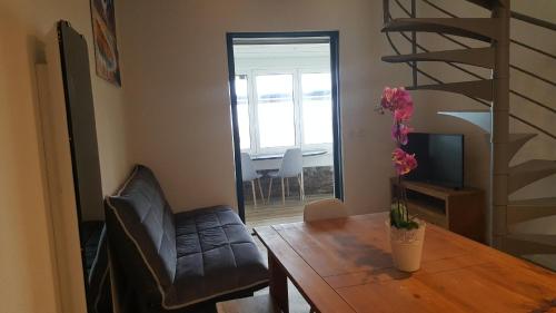 Posezení v ubytování Appartement CAPBRETON face à l'océan sans vis à vis, avec piscine