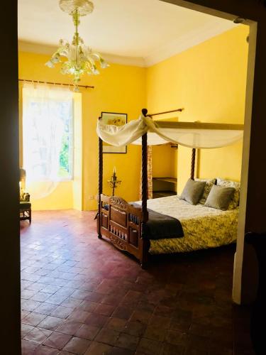 Postel nebo postele na pokoji v ubytování Domaine Mas Pigné