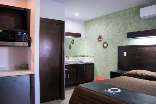 Kuhinja ili čajna kuhinja u objektu Hotel Onix Suites