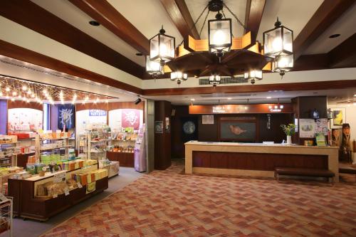 a store lobby with a store counter and a pharmacy at Nozawa Grand Hotel in Nozawa Onsen