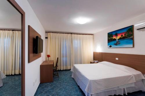 Postel nebo postele na pokoji v ubytování D Beach Resort