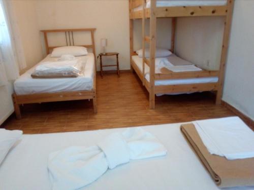 Una cama o camas en una habitación de Olympus Aegean House