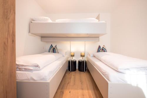 מיטה או מיטות בחדר ב-Freches Wohnen
