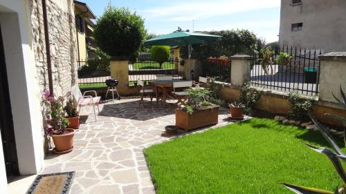 Κήπος έξω από το B&B Bergamo e Brescia