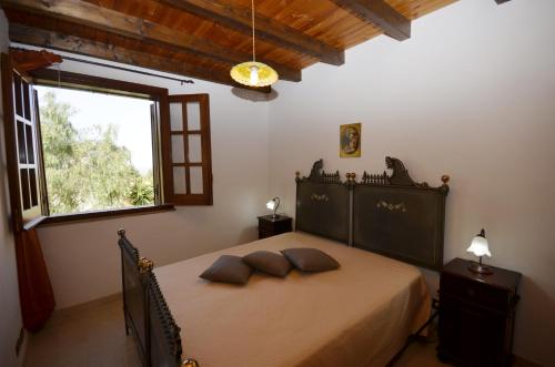 Posteľ alebo postele v izbe v ubytovaní Baglio Fontana