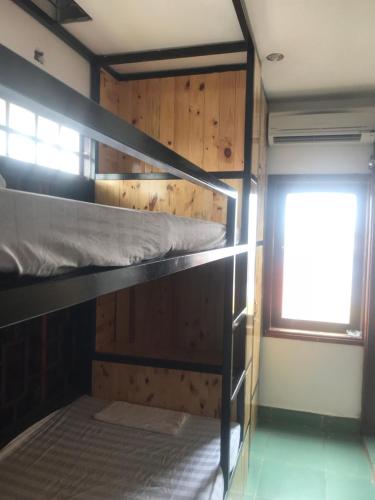 Ένα ή περισσότερα κρεβάτια σε δωμάτιο στο Thao Trang Hotel
