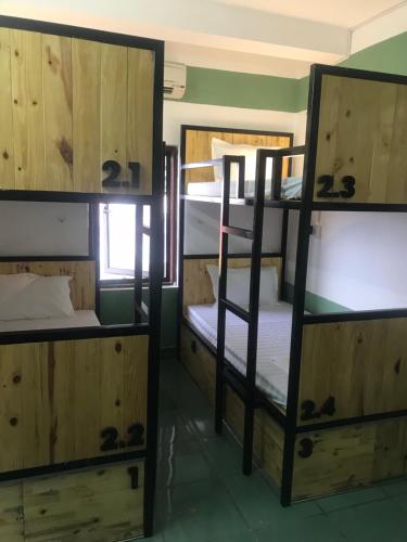 Ένα ή περισσότερα κρεβάτια σε δωμάτιο στο Thao Trang Hotel