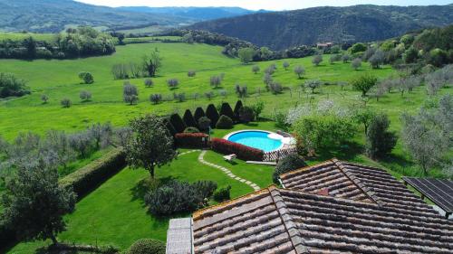 Fotografia z galérie ubytovania Villa esclusiva in Toscana con piscina privata v destinácii Montecastelli