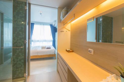 Ένα μπάνιο στο Veranda Residence Pattaya by Boom