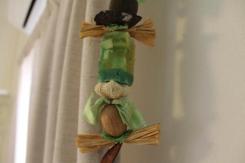 a stuffed animal in a bottle on a wall at B&B Villa Luna in Bayahibe