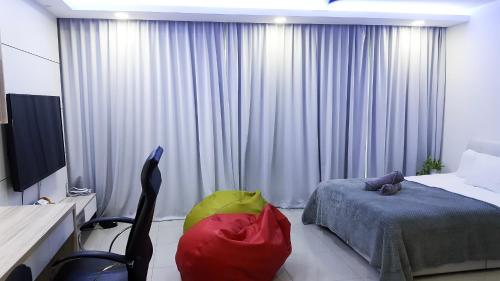 Ένα ή περισσότερα κρεβάτια σε δωμάτιο στο Yamada Residence, Trefoil