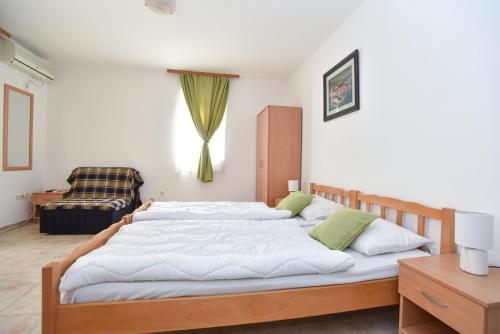 Cama o camas de una habitación en Apartmani Alexandra