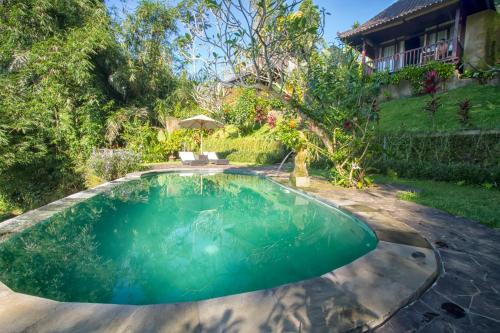 Πισίνα στο ή κοντά στο Villa Wedang