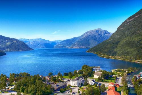 an aerial view of a town next to a body of water at Kinsarvik Fjordhotel, BW Signature Collection in Kinsarvik