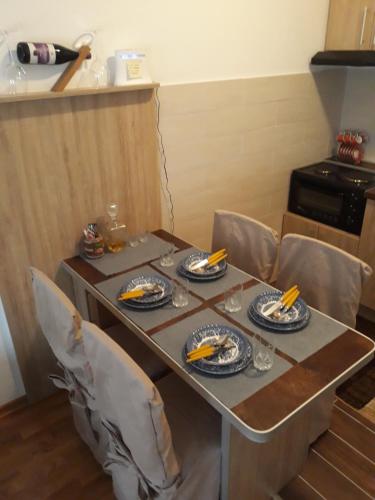 O bucătărie sau chicinetă la Apartment Hedonic