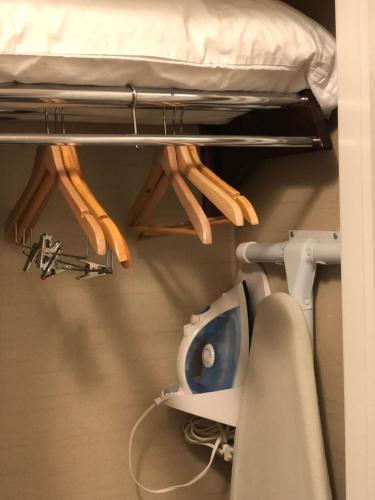 a room with a bunk bed and a toilet at Grand Hotel in Sunnyvale