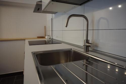 Køkken eller tekøkken på Corner Apartments