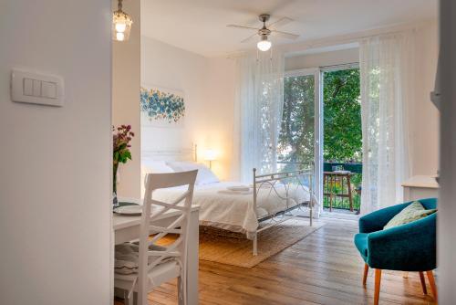 Postel nebo postele na pokoji v ubytování Adriatic Apartments