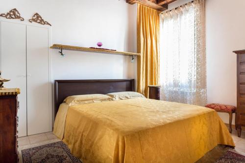 Ein Bett oder Betten in einem Zimmer der Unterkunft Your Suite by St.Mark's Square