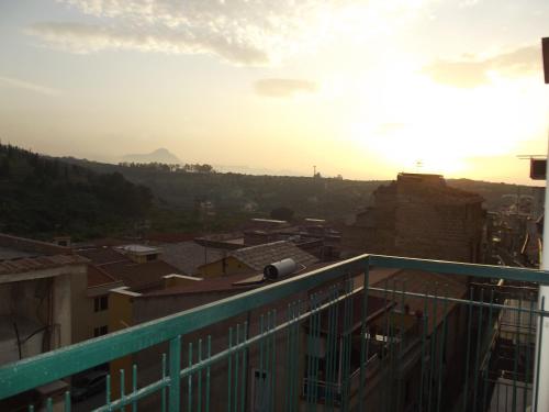a view of the city from the balcony of a building at Le Due Sicilie B&B in Lascari
