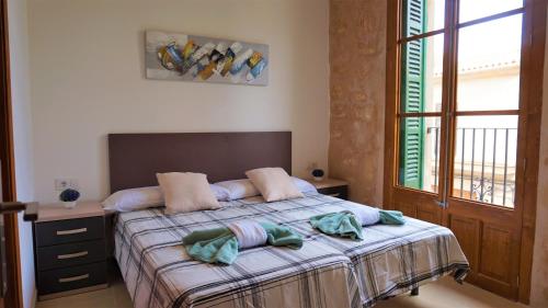 Säng eller sängar i ett rum på Villa Major 88 - House in Lluchmayor, Mallorca