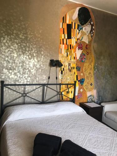 Postel nebo postele na pokoji v ubytování villa Orchidee Sardegna
