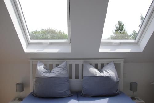 Кровать или кровати в номере Glück Auf im Pott