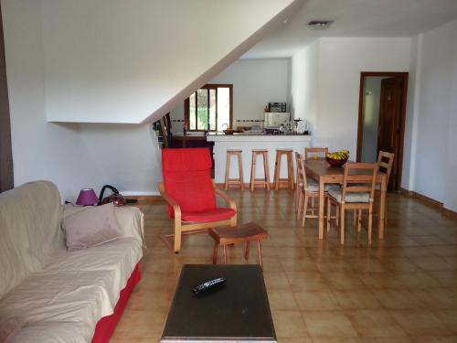 a living room with a couch and a table at Apartamentos Los Medanos in Valle Gran Rey