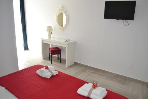 Postel nebo postele na pokoji v ubytování Cava Boutique Hotel