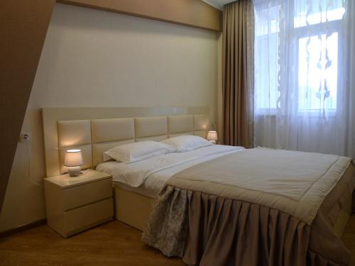 Postel nebo postele na pokoji v ubytování City Star