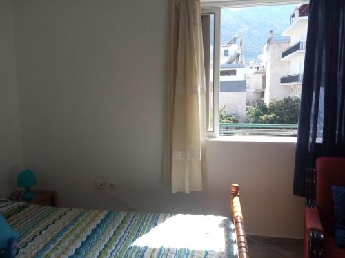 Postel nebo postele na pokoji v ubytování Anastasia - Efthimios Apartments