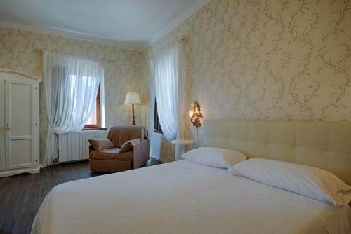 Ένα ή περισσότερα κρεβάτια σε δωμάτιο στο Miglioranzi Apartments