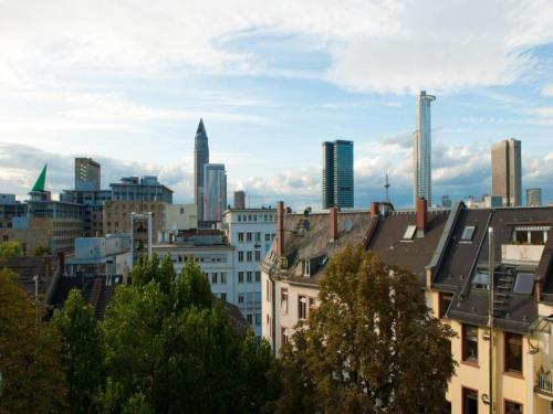 a view of a city skyline with tall buildings at Hotel Plaza in Frankfurt/Main