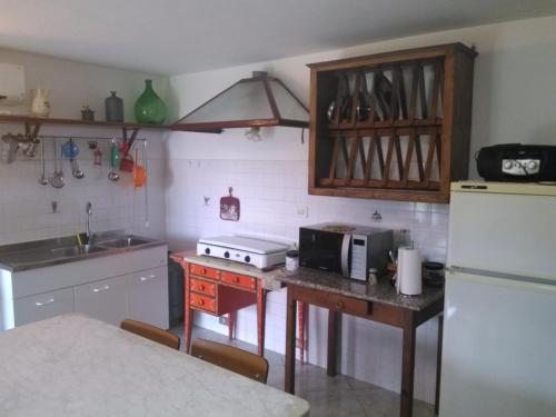 Η κουζίνα ή μικρή κουζίνα στο Casale Le Poiane