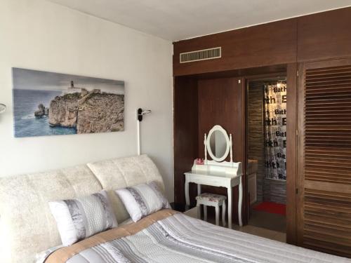 Cama o camas de una habitación en Praia da Rocha Apartment
