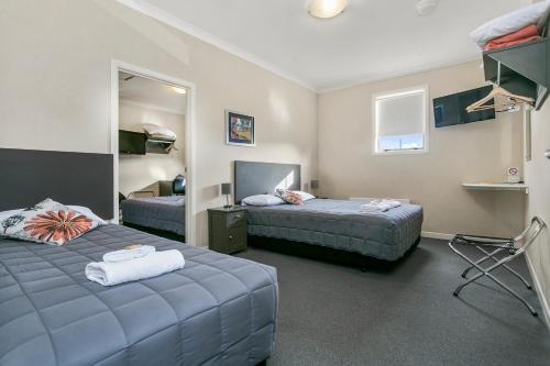 Katil atau katil-katil dalam bilik di No 1 Motels