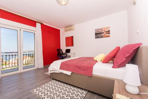 Postel nebo postele na pokoji v ubytování Apartmani Island