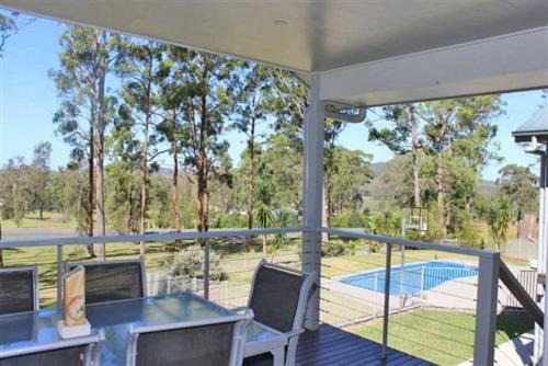 A view of the pool at Banyula, 103 Neville Morton Drive or nearby