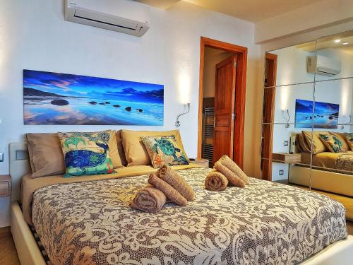 Postel nebo postele na pokoji v ubytování Brezza Marina Guesthouse