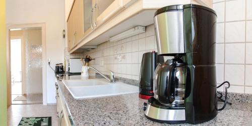 Kuchyň nebo kuchyňský kout v ubytování Ferienwohnung Helianthus