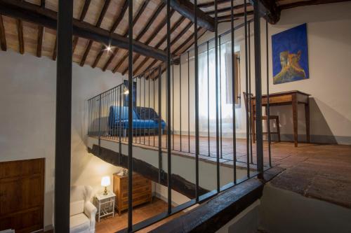 Ένα ή περισσότερα κρεβάτια σε δωμάτιο στο Villa Le Caggia