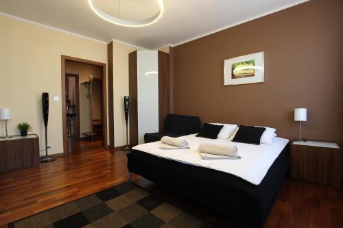 Cama o camas de una habitación en Rainbow Apartments 1