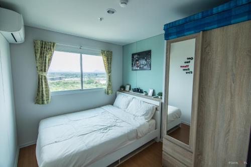 Postel nebo postele na pokoji v ubytování Sea View Residence