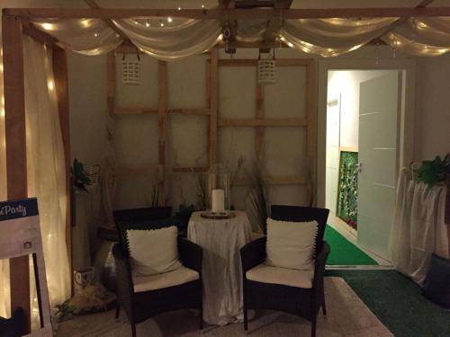 a table and chairs in a room with a tent at Grand Hotel Stella Maris Italia in Palmi